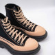 ALEXANDER MCQUEEN TREAD SLICK ANKLE BOOTS IN BLACK-PINK
